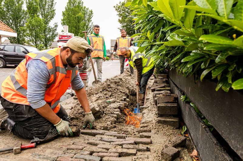 De straat terugleggen